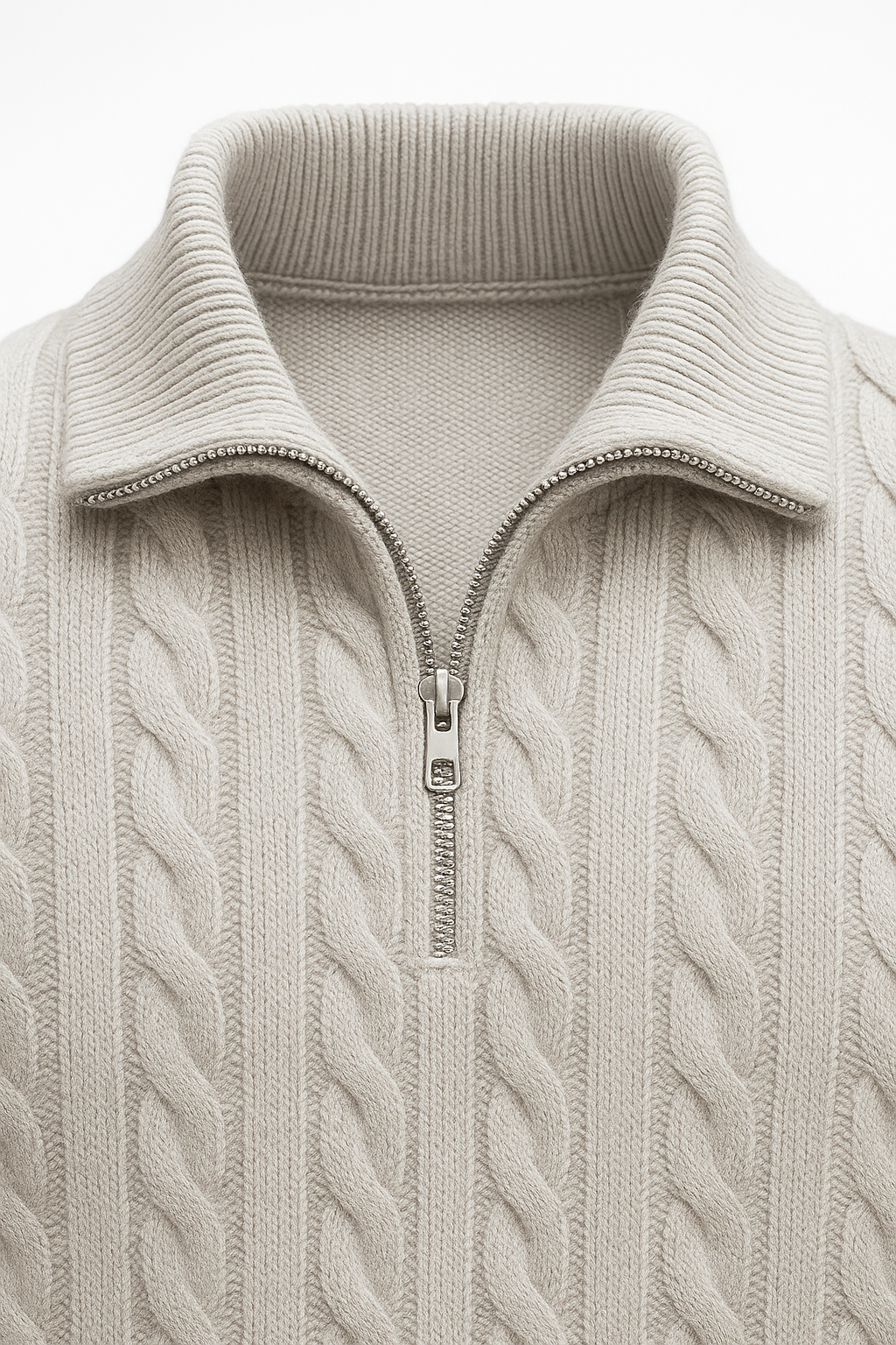 Emiral Couture grey cable knit sweater made from soft merino wool, featuring a cozy design and textured pattern.