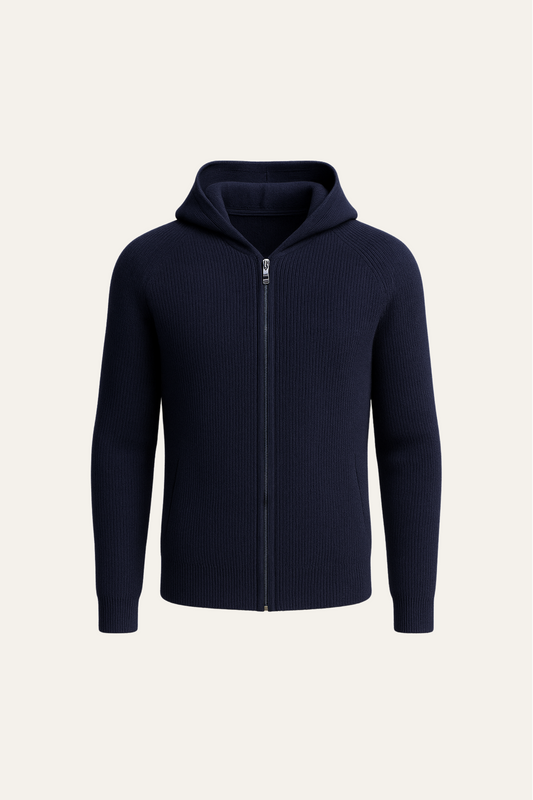 Navy hooded sweater made of merino wool by Emiral Couture, featuring a relaxed fit and ribbed cuffs.