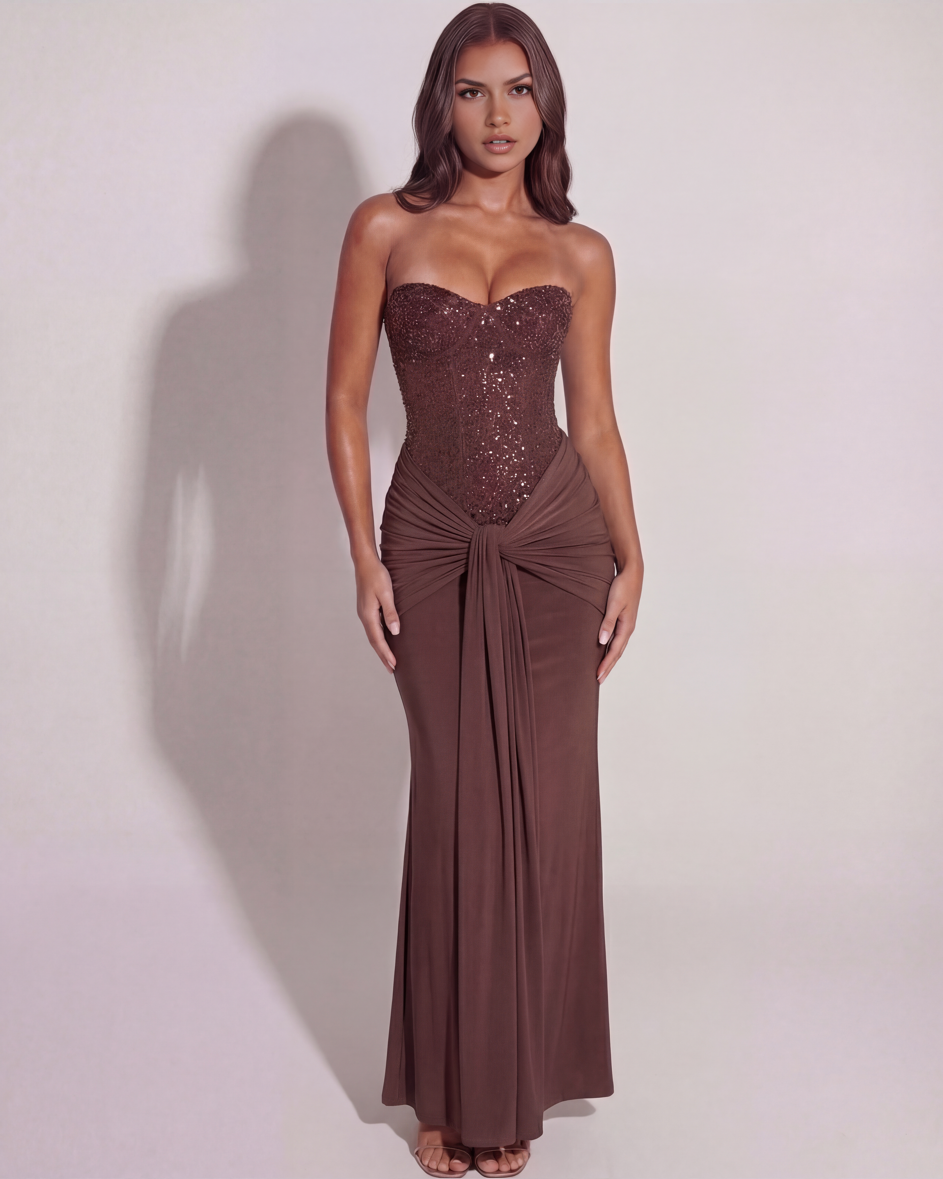 Long dress with shiny corset and draping