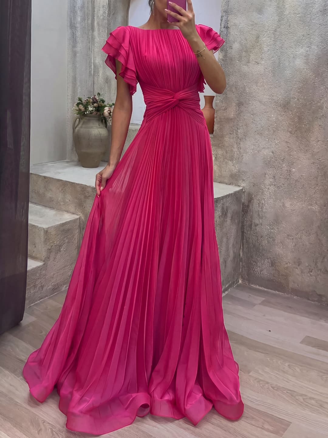 Pleated dress with knot detail