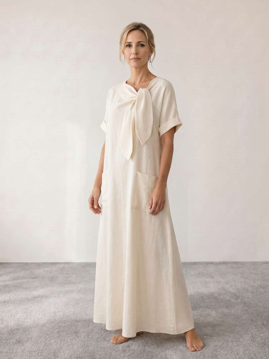 Vestido midi fluido con lazada al cuello