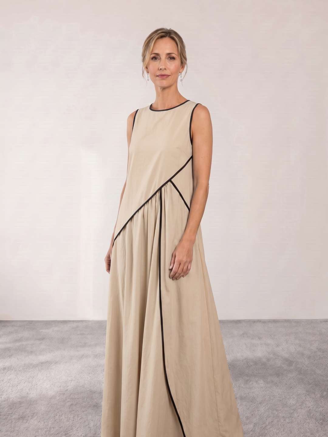 Flowing long dress with structured detail